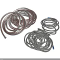 Copper and Gray Coiled Metal Tubes with Blue Accents on Gray Background