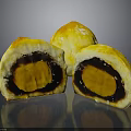 Delicious Egg Yolk Pastry With Golden Crust Cut Open Revealing Rich Filling