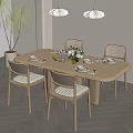 Modern Minimalist Dining Space With Wooden Table Rattan Chairs Pendant Lights And Green Plant