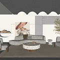 Modern Living Room Interior With Grey Sofa Round Coffee Table Artwork And Green Plant