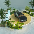 Bentley Car Display In Indoor Setting With Green Plants And Trees Around Circular Platform