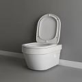 Modern White Toilet with Open Lid and Clean Lines Against Gray Wall Interior