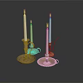 Lit White Candles On Decorative Metal Candle Holders With Intricate Patterns
