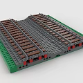 Creative Building Blocks Railway Tracks Design With Green Edges Gray Base Plate And Red Connectors