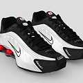 Stylish Black And White Sneakers With Red Accents And Nike Logo