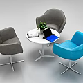 Gray and Blue Modern Lounge Chairs with White Round Table Green Plant Notebook and Laptop