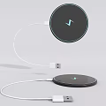 Wireless Charger with Circular Black Panel and White USB Charging Cable