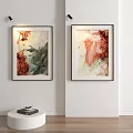 Vibrant Abstract Paintings In Black Frames Hanging On White Wall Art