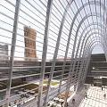 Modern Office Corridor With Arched Glass Roof Natural Light And Surrounding High Rise Buildings