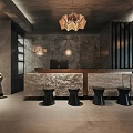 Reception Area Interior With Stone Counter Black Stools Pendant Lights And Sculpture