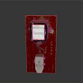Red Decorative Item With Transparent Panel And White Label Design