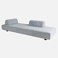Gray Upholstered Chaise Lounge With Modern Design And Comfortable Cushions