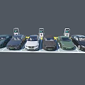 Row of Various Colored Electric Cars Parked at Charging Stations