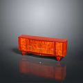 Red Carved Wooden Cabinet With Intricate Patterns And Legs On Reflective Surface