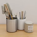 Silver And White Desk Organizers With Stationery Tools And Scented Candle
