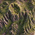 Natural Garden Landscape With Lush Green Mountain Slopes And Blue Water Bodies