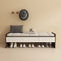 Entryway Bench With Checkered Cushion Stacked Books And Shoe Storage Drawers On Beige Wall