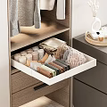 Wooden Wardrobe Drawer With Organized Folded Items And Colorful Storage Design