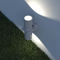 Outdoor Light Standing On Grass With Bright Illumination Near White Wall