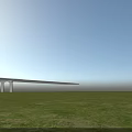 Modern Suspension Bridge With Cable Towers Road Lanes Green Grass And River