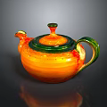 Orange Glossy Teapot With Green Lid And Handle For Daily Household Use