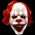 Scary Clown Mask With Red Hair White Face Red Stripes And Yellow Teeth