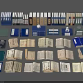 Diverse Open Books and Stacked Magazines Featuring Colored Covers and Various Sizes