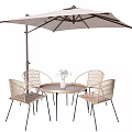Outdoor Landscape Seating With Rattan Chairs Table And Sunshade Umbrella
