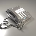 Classic Landline Telephone With Handset Keypad And Coiled Cord Design For Communication Use