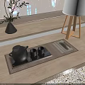 Modern Tea Set With Black Teapot Cups On Tray And Woven Mat By Window Sill