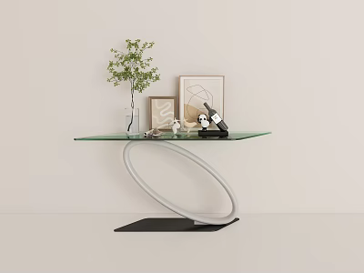Modern Console Table With Glass Top And Curved Metal Base Featuring Green Plant Photo Frames And Decorative Items 3d model