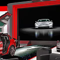 Tesla Exhibition Booth Featuring Red Car Display Large Screens And Modern Design 3d model
