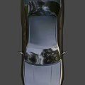 Gray Two Door Sports Car With Sleek Exterior Design And Alloy Wheels