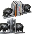 Stylish Books Arranged With Decorative Skull Bookends On Home Shelf Decor