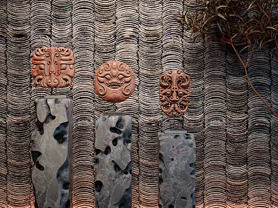 Decorative Ornament Combination on Textured Wall Featuring Carved Masks and Hollow-out Decorative Pieces 3d model