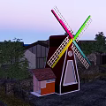 Colorful Windmill Blades And Tower Structure With Village Houses And Trees