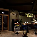 Modern Lounge Bar Interior With Grill Counter Bar Stools And Neon Lighting