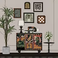 Painted Artistic Entryway Cabinet And Sideboard With Green Plant And Wall Decor