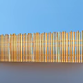 Golden Wooden Garden Fence With Vertical Slats And Curved Design For Outdoor Decor