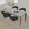 Modern Dining Table Set with White Tabletop Black Chairs and Green Plant in Modern Kitchen