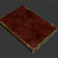 Vintage Red Book With Worn Leather Cover And Gold Accents