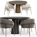 Modern Dining Table Set with Round Wooden Top and Upholstered Metal Leg Chairs
