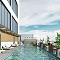 Modern Swimming Pool With Sun Loungers And Green Plants In Outdoor Modern Building Setting
