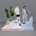 Window Display With Female Figures Green Plants And Decorative Pink Blue Structures