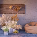 Potted Ornamental Grass Plants With Wooden Decorative Board And Bean Bag Chair Against Gray Wall