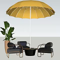 Outdoor Table and Chairs Set with Beige Umbrella Gray Chairs and Green Plant