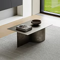 Minimalist Metal Coffee Table With Magazine And Bowl On Gray Rug By Window
