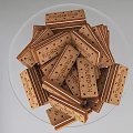 Assorted Cookies And Pastries On Glass Pedestal Trays With Pink Bow Decoration