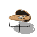 Modern Round Coffee Table With Wooden Top And Black Metal Legs Featuring Tea Set