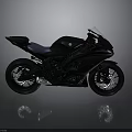 Yamaha Black Sport Motorcycle with Blue Seat and Sleek Aerodynamic Design